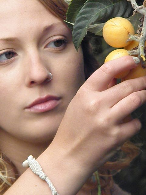 http://curezone.com/upload/Blogs/Your_Enchanted_Gardener/Abagail_Reed_with_Loquat_Tree.jpg