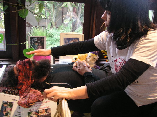 http://curezone.com/upload/blogs/your_enchanted_gardener/Dania_gives_treatment_500.jpg